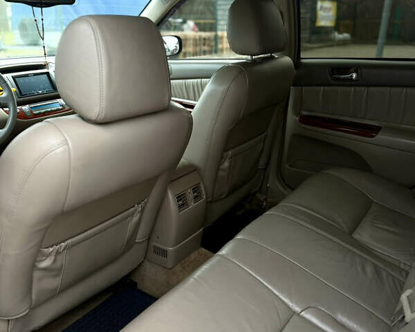 Чорний Тойота Камрі, об'ємом двигуна 3 л та пробігом 203 тис. км за 3999 $, фото 21 на Automoto.ua