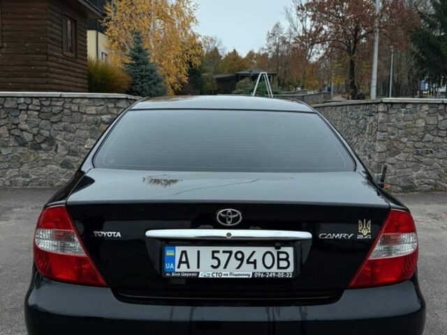 Черный Тойота Камри, объемом двигателя 2.4 л и пробегом 570 тыс. км за 6199 $, фото 3 на Automoto.ua