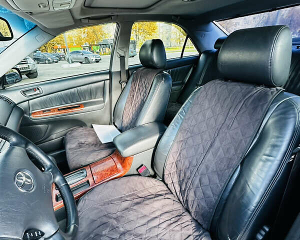 Тойота Камри 2004 в Харькове на Automoto.ua Черный Тойота Камри, объемом двигателя 3 л и пробегом 275 тыс. км за 4999 $, фото 13 на Automoto.ua