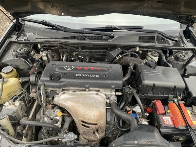 Черный Тойота Камри, объемом двигателя 2.4 л и пробегом 310 тыс. км за 5600 $, фото 8 на Automoto.ua