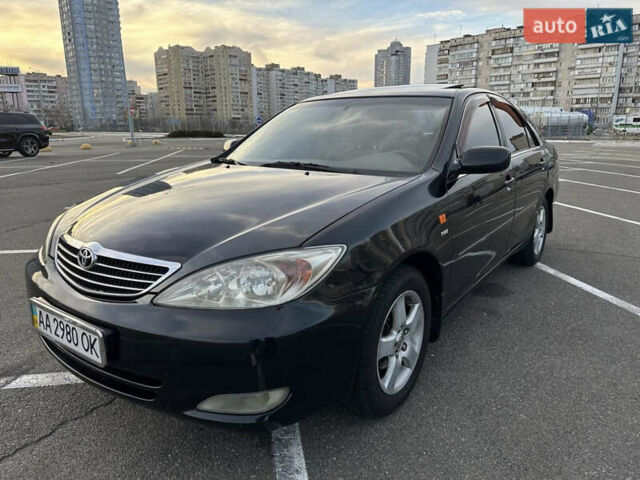 Черный Тойота Камри, объемом двигателя 2.4 л и пробегом 315 тыс. км за 5800 $, фото 9 на Automoto.ua