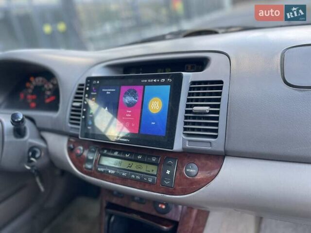 Черный Тойота Камри, объемом двигателя 3 л и пробегом 300 тыс. км за 4400 $, фото 17 на Automoto.ua