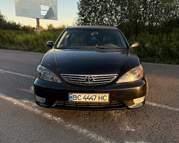 Черный Тойота Камри, объемом двигателя 3 л и пробегом 300 тыс. км за 6000 $, фото 5 на Automoto.ua