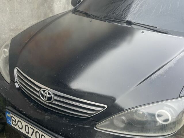 Черный Тойота Камри, объемом двигателя 3 л и пробегом 200 тыс. км за 6000 $, фото 1 на Automoto.ua