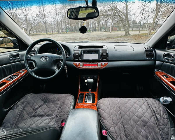 Черный Тойота Камри, объемом двигателя 3 л и пробегом 301 тыс. км за 4500 $, фото 20 на Automoto.ua