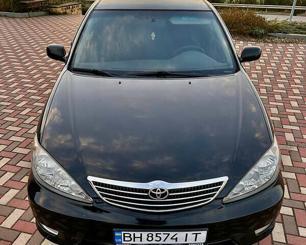 Черный Тойота Камри, объемом двигателя 3 л и пробегом 285 тыс. км за 6500 $, фото 2 на Automoto.ua