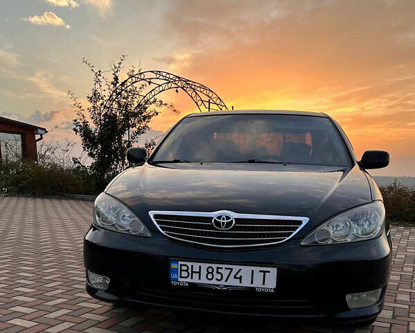 Черный Тойота Камри, объемом двигателя 3 л и пробегом 285 тыс. км за 6500 $, фото 3 на Automoto.ua