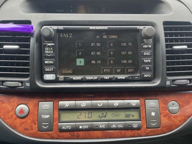 Черный Тойота Камри, объемом двигателя 2.4 л и пробегом 310 тыс. км за 5600 $, фото 7 на Automoto.ua