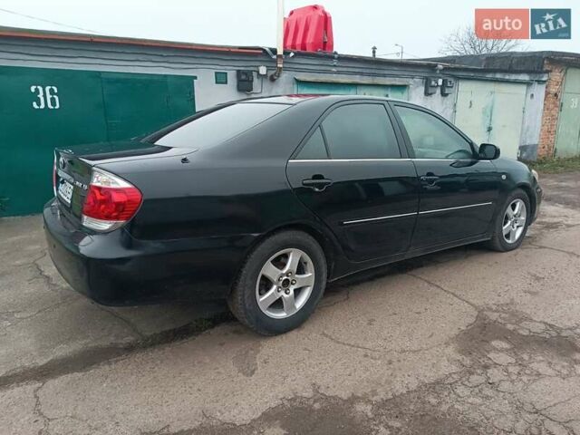 Черный Тойота Камри, объемом двигателя 3 л и пробегом 370 тыс. км за 4500 $, фото 2 на Automoto.ua