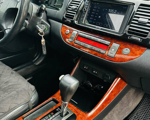 Черный Тойота Камри, объемом двигателя 3 л и пробегом 301 тыс. км за 4500 $, фото 24 на Automoto.ua