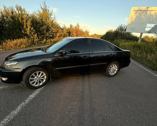 Черный Тойота Камри, объемом двигателя 3 л и пробегом 300 тыс. км за 6000 $, фото 13 на Automoto.ua