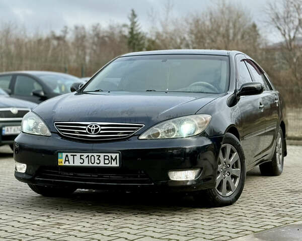 Чорний Тойота Камрі, об'ємом двигуна 3 л та пробігом 203 тис. км за 3999 $, фото 2 на Automoto.ua