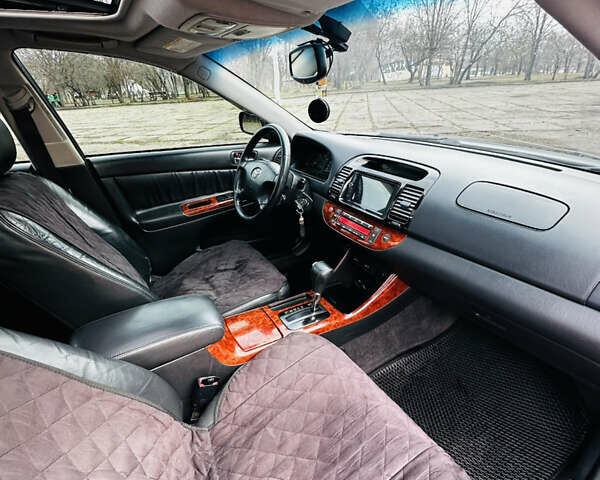 Черный Тойота Камри, объемом двигателя 3 л и пробегом 301 тыс. км за 4500 $, фото 22 на Automoto.ua