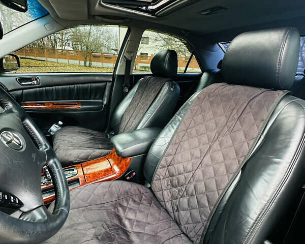 Черный Тойота Камри, объемом двигателя 3 л и пробегом 301 тыс. км за 4500 $, фото 12 на Automoto.ua