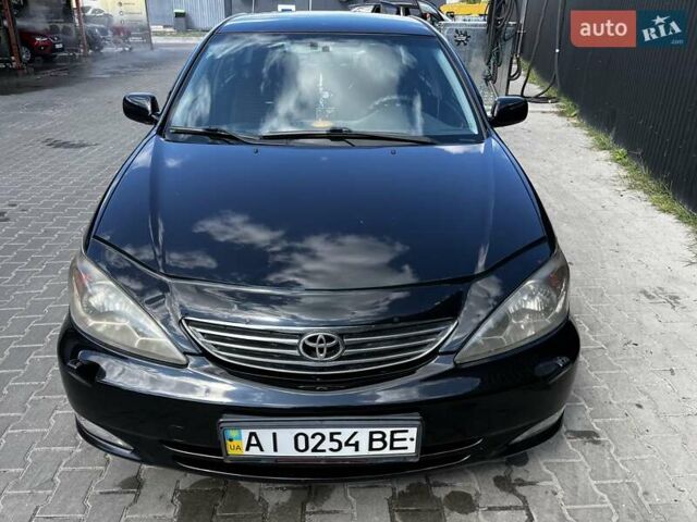 Чорний Тойота Камрі, об'ємом двигуна 2.37 л та пробігом 437 тис. км за 6400 $, фото 4 на Automoto.ua