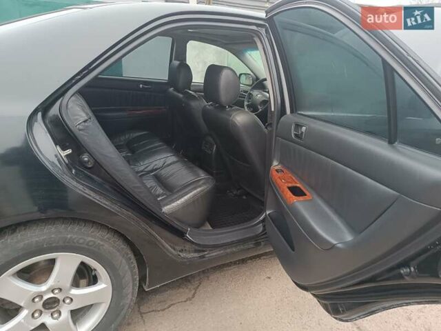 Черный Тойота Камри, объемом двигателя 3 л и пробегом 370 тыс. км за 4500 $, фото 12 на Automoto.ua