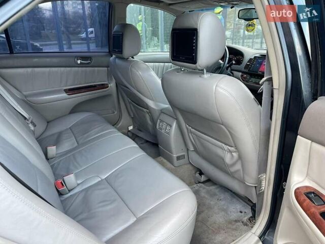 Черный Тойота Камри, объемом двигателя 3 л и пробегом 300 тыс. км за 4400 $, фото 16 на Automoto.ua