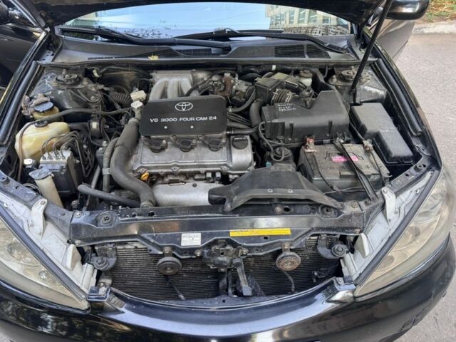 Черный Тойота Камри, объемом двигателя 3 л и пробегом 285 тыс. км за 5100 $, фото 5 на Automoto.ua