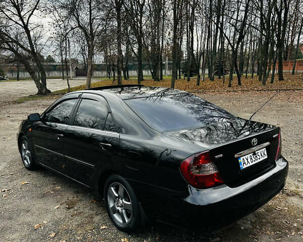 Черный Тойота Камри, объемом двигателя 3 л и пробегом 301 тыс. км за 4500 $, фото 5 на Automoto.ua