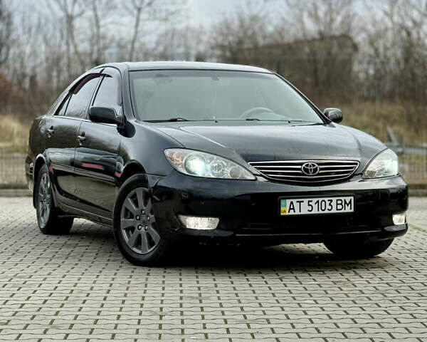 Чорний Тойота Камрі, об'ємом двигуна 3 л та пробігом 203 тис. км за 3999 $, фото 5 на Automoto.ua