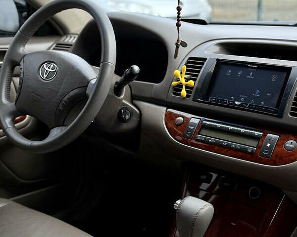 Чорний Тойота Камрі, об'ємом двигуна 3 л та пробігом 203 тис. км за 3999 $, фото 17 на Automoto.ua