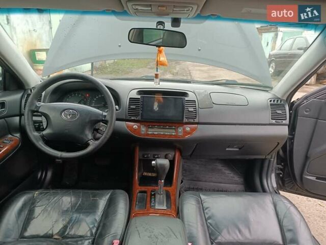 Черный Тойота Камри, объемом двигателя 3 л и пробегом 370 тыс. км за 4500 $, фото 14 на Automoto.ua