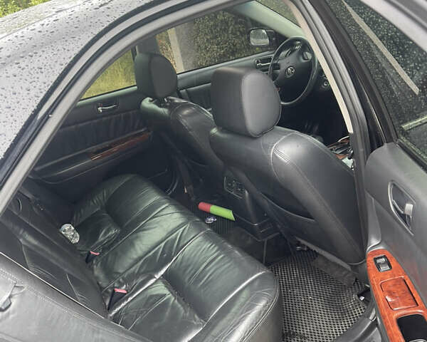 Черный Тойота Камри, объемом двигателя 3 л и пробегом 340 тыс. км за 6700 $, фото 7 на Automoto.ua