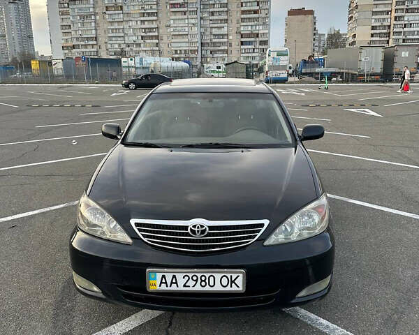 Черный Тойота Камри, объемом двигателя 2.4 л и пробегом 309 тыс. км за 6699 $, фото 10 на Automoto.ua