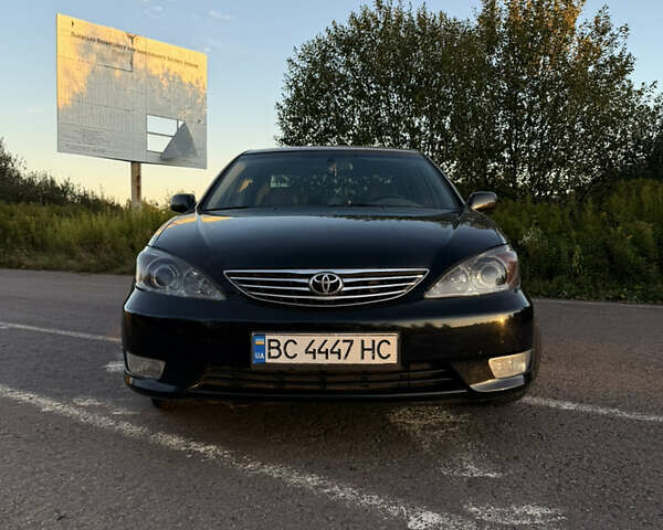 Черный Тойота Камри, объемом двигателя 3 л и пробегом 300 тыс. км за 6000 $, фото 15 на Automoto.ua