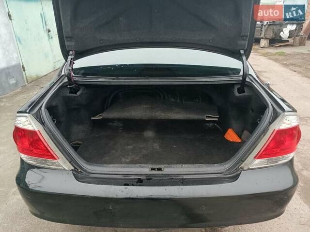 Черный Тойота Камри, объемом двигателя 3 л и пробегом 370 тыс. км за 4500 $, фото 10 на Automoto.ua