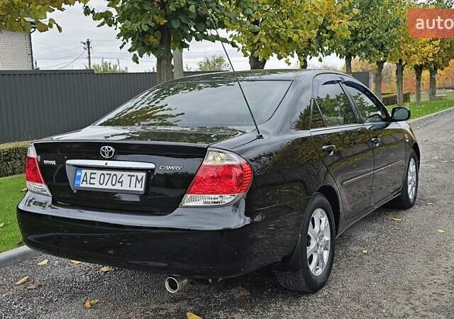 Тойота Камри 2004 в Каменское - Днепродзержинск на Automoto.ua Черный Тойота Камри, объемом двигателя 2 л и пробегом 180 тыс. км за 6700 $, фото 1 на Automoto.ua