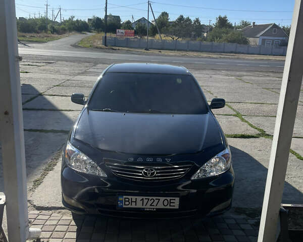Черный Тойота Камри, объемом двигателя 3 л и пробегом 340 тыс. км за 6700 $, фото 1 на Automoto.ua
