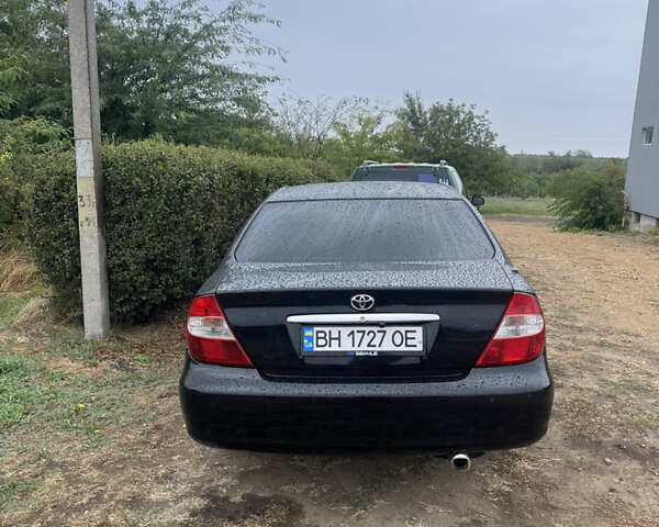 Черный Тойота Камри, объемом двигателя 3 л и пробегом 340 тыс. км за 6700 $, фото 10 на Automoto.ua