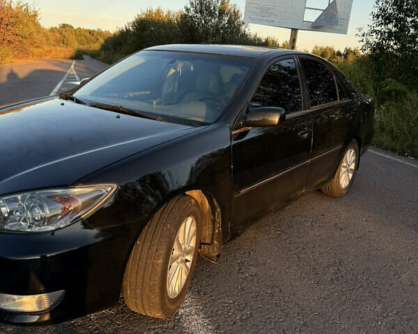 Черный Тойота Камри, объемом двигателя 3 л и пробегом 300 тыс. км за 6000 $, фото 11 на Automoto.ua