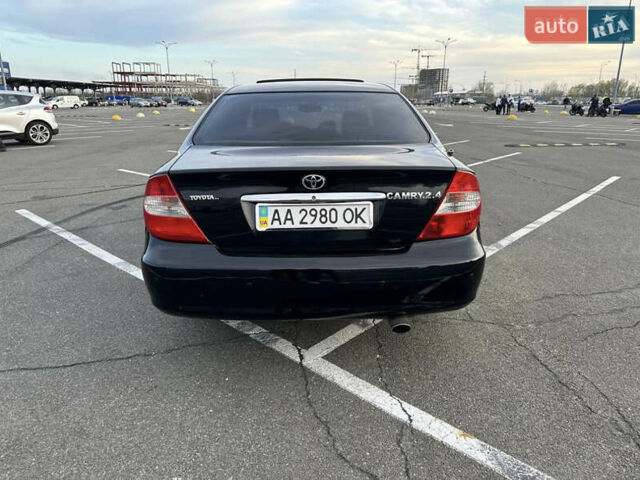 Черный Тойота Камри, объемом двигателя 2.4 л и пробегом 315 тыс. км за 5800 $, фото 4 на Automoto.ua