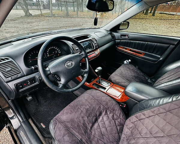 Черный Тойота Камри, объемом двигателя 3 л и пробегом 301 тыс. км за 4500 $, фото 11 на Automoto.ua