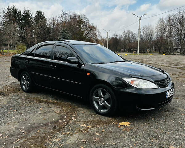 Черный Тойота Камри, объемом двигателя 3 л и пробегом 301 тыс. км за 4500 $, фото 8 на Automoto.ua