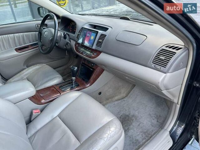 Черный Тойота Камри, объемом двигателя 3 л и пробегом 300 тыс. км за 4400 $, фото 15 на Automoto.ua