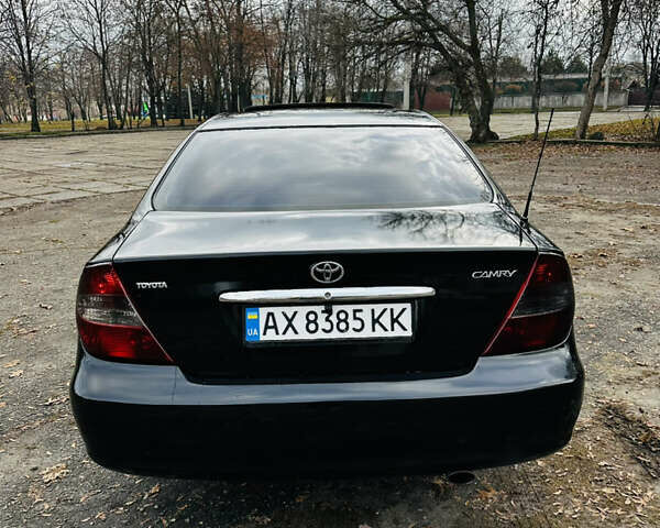 Черный Тойота Камри, объемом двигателя 3 л и пробегом 301 тыс. км за 4500 $, фото 4 на Automoto.ua
