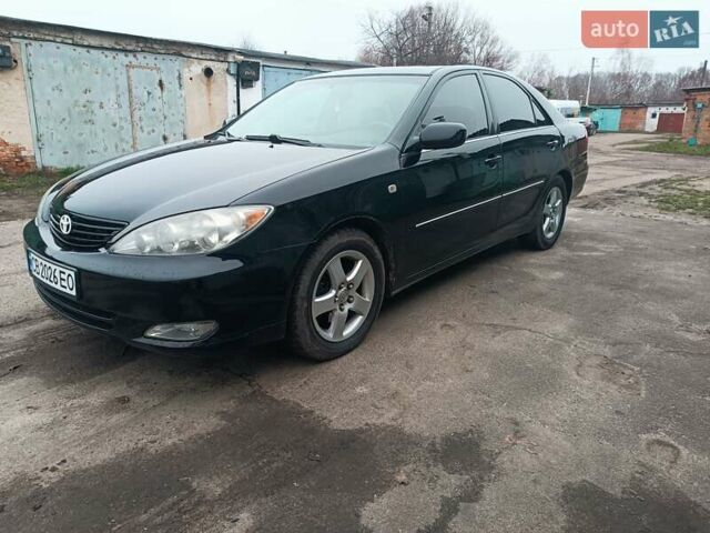 Черный Тойота Камри, объемом двигателя 3 л и пробегом 370 тыс. км за 4500 $, фото 6 на Automoto.ua