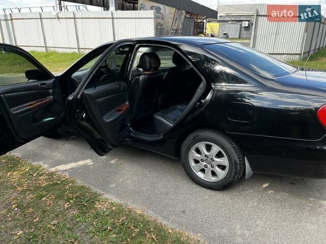 Чорний Тойота Камрі, об'ємом двигуна 2.37 л та пробігом 437 тис. км за 6400 $, фото 18 на Automoto.ua
