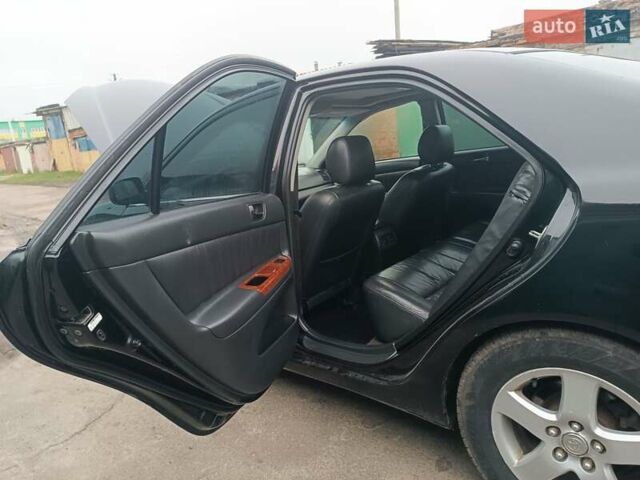 Черный Тойота Камри, объемом двигателя 3 л и пробегом 370 тыс. км за 4500 $, фото 11 на Automoto.ua