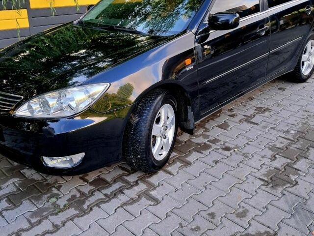 Черный Тойота Камри, объемом двигателя 2.4 л и пробегом 3 тыс. км за 6400 $, фото 1 на Automoto.ua