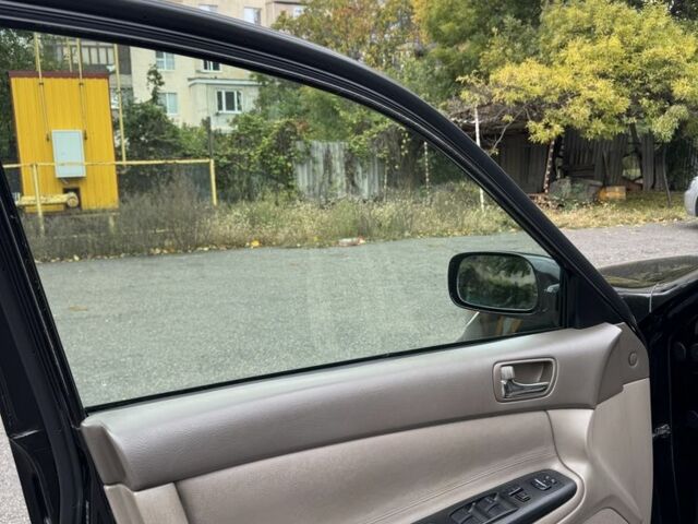 Черный Тойота Камри, объемом двигателя 2.4 л и пробегом 180 тыс. км за 6000 $, фото 13 на Automoto.ua