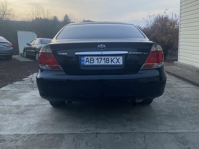 Черный Тойота Камри, объемом двигателя 2.4 л и пробегом 300 тыс. км за 7500 $, фото 5 на Automoto.ua