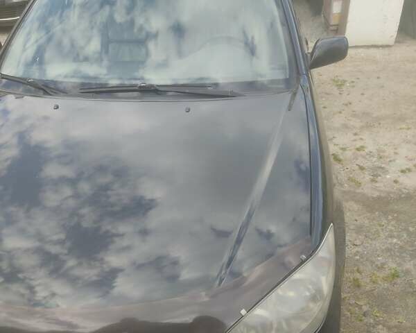 Чорний Тойота Камрі, об'ємом двигуна 3 л та пробігом 208 тис. км за 6700 $, фото 34 на Automoto.ua