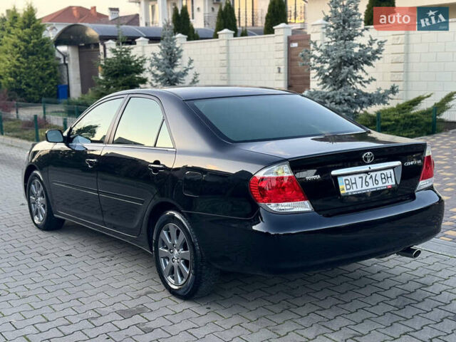 Черный Тойота Камри, объемом двигателя 2.36 л и пробегом 98 тыс. км за 8700 $, фото 12 на Automoto.ua