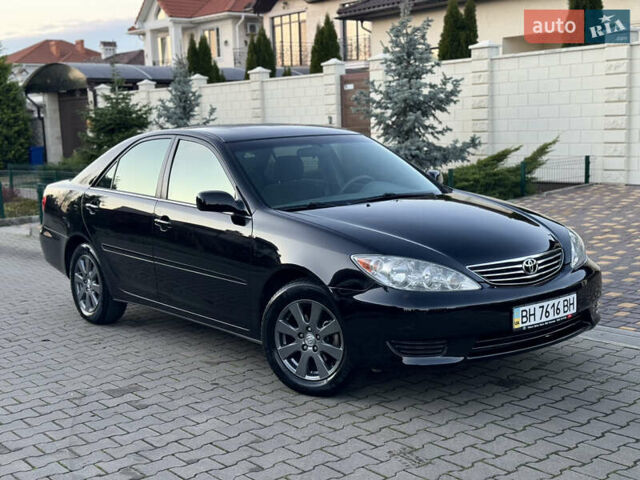 Черный Тойота Камри, объемом двигателя 2.36 л и пробегом 98 тыс. км за 8700 $, фото 32 на Automoto.ua
