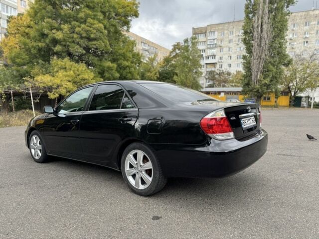 Черный Тойота Камри, объемом двигателя 2.4 л и пробегом 180 тыс. км за 6000 $, фото 3 на Automoto.ua