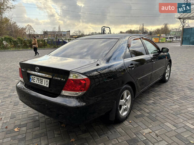 Черный Тойота Камри, объемом двигателя 2.4 л и пробегом 326 тыс. км за 6300 $, фото 5 на Automoto.ua